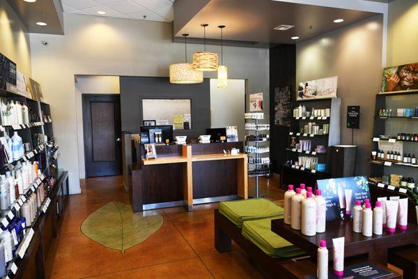 The retail and reception area at Breeze Salon and Day Spa, Cedar Park's best Aveda salon and spa.