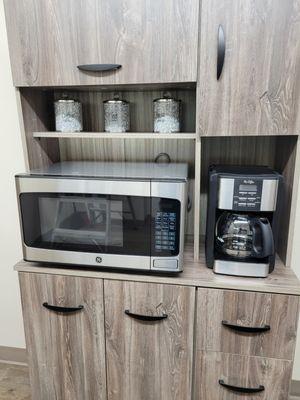 Our kitchenette includes a microwave and coffee pot