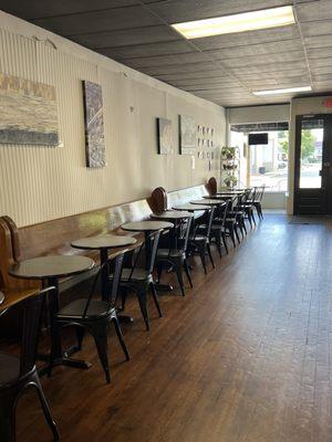 Beautiful hardwood floors and open seating