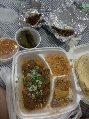 Birria de Res Combo and tacos de asada..the picture doesn't do it Justice though! It was so yummy!