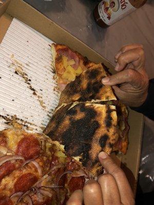 THE WHOLE PIZZA BOTTOM WAS BURNT