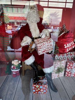 Christmases Past in the windows. The Exterior of Merry Go Round Antique Mall in Bakersfield  CA.