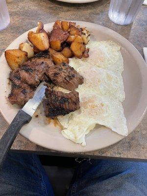 Steak tips (regular size) and eggs over easy with home fries