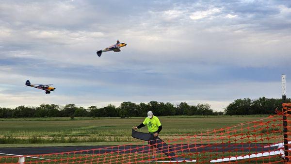 Red Bull skinned model planes pulling off some pretty amazing stunts.