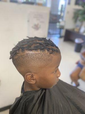 Bald fade and retwist by reggie