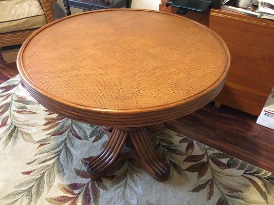 Tommy Bahama style table with glass top not shown.