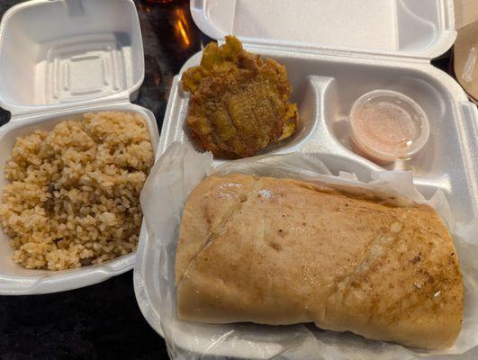 Arroz con gandules, tostones, and a pernil sandwich