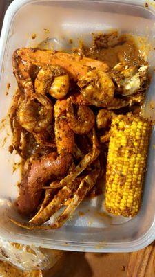 Crab legs, shrimp, corn. Medium heat. Lemon n garlic seasoning.