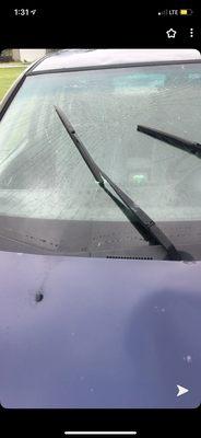 Windshield a few days after I had to clean out thin shards of glass inside my car.