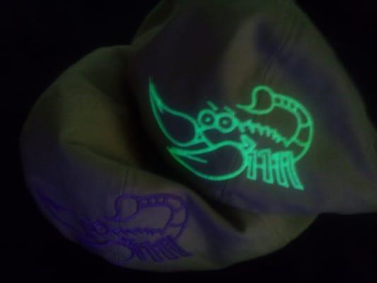 Lights Out Exterminating icon in glow-in-the dark thread.