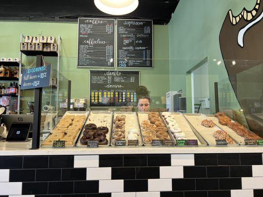 Doughnut counter at noon on a Saturday