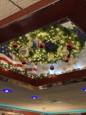 Dining room ceiling decorated for the holidays