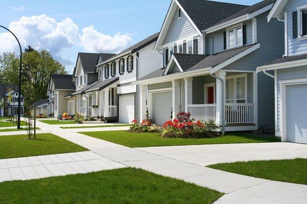 A row of newer homes in a suburban neighborhood.