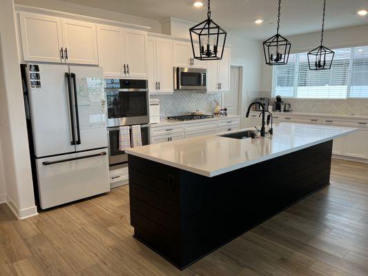 Added nickel gap shiplap around the island in this new kitchen