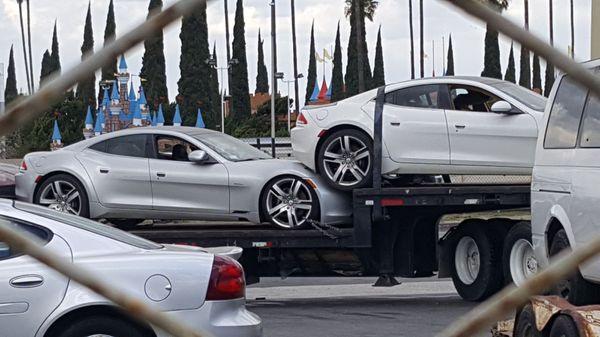 Looks like Fisker is dropping off some Karma EVs to become soda cans