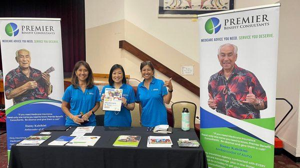 Agents Donne Soga, Erin Lum and Julie Hall working a senior fair