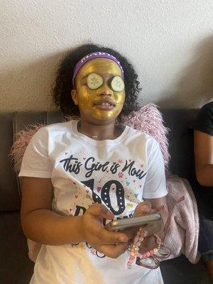 My daughter enjoying her face mask.