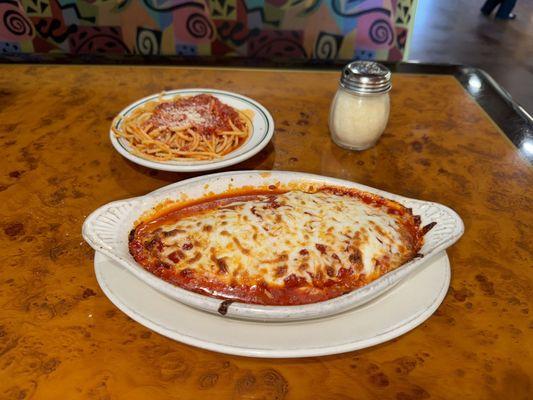 Chicken Parmesan and side spaghetti with marinara sauce