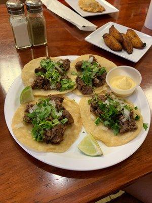 beef tacos with a side of plantains