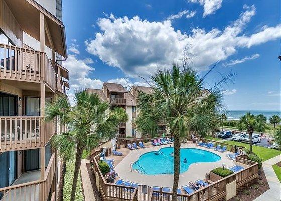 This exceptional 3 bedroom / 2 bath condo directly overlooks the pool / courtyard & provides excellent ocean views. Myrtle Beach SC #222015