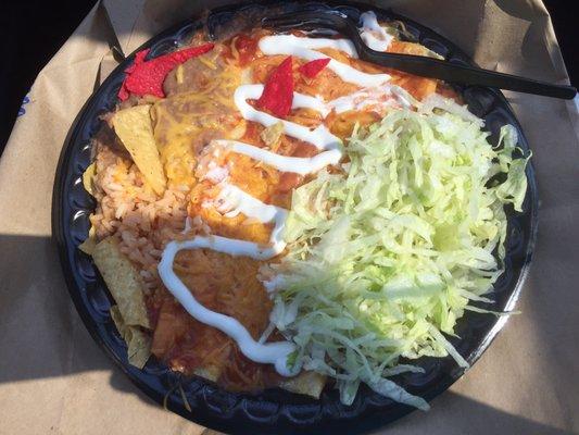 Cheese enchiladas with rice and beans; the sides needed salt).