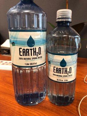 Earth2o 1 liter and half liter bottles .