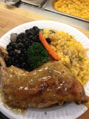 Roast chicken with yellow rice and black beans