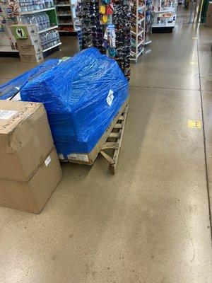 The pallet that is sticking out with no caution sign in sight.