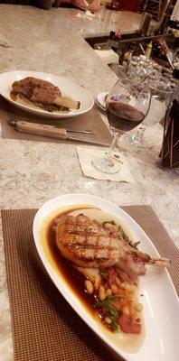 Veal chop is the top plate. Pork chop is the bottom plate. Both were medium rare and absolutely delicious!