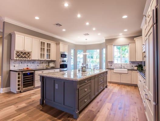 White & Greige shaker style cabinets.  Black galaxy & Alaska Granite countertops.  http://www.dsscabinetscountertops.com