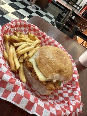 Chicken fried chicken sandwich on a wheat sourdough bun. Swiss cheese was an add on.