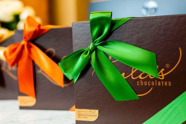 Each box has a hand tied satin ribbon to make it the perfect gift.