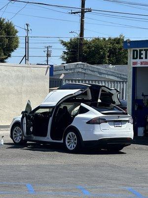 Tesla with the butterfly doors.