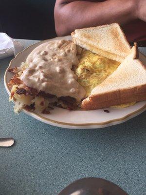 Omelette with gravy on the home fries