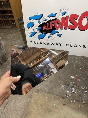 breakaway glass mirror