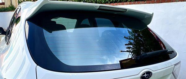 Read hatch glass with 25/15 Cool Vu transitional tint.