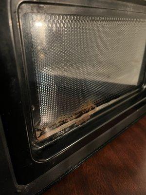 MMMMM... they left me a complimentary snack on the j side door of the microwave.