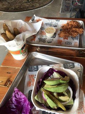 Veggie burger, chicken tenders and pickle fries from Burger Joint next door