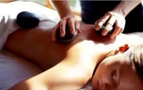 Deeply relax and release tension with heated lava stones