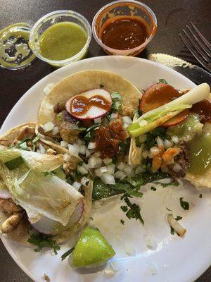 Chicken, chicharron, and ground beef tacos