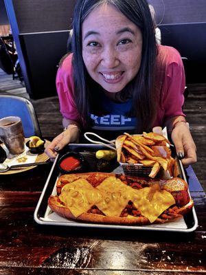 Delicious yet giant chili dog!