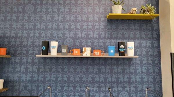 Love the wall and cup display!