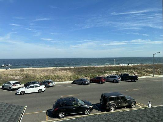 Over night parking is across the street from the Hotel FACING the Ocean. It frees up around 5:00pm as beach goers are leaving for the day.