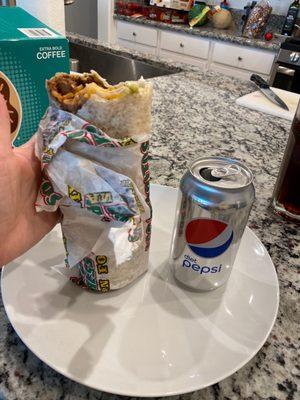 Super burrito with can for size comparison.