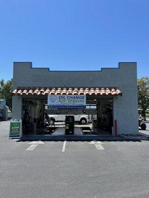 Oil Change building in same parking lot as car wash and gas station