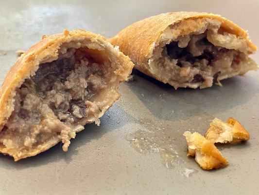 Natchitoches Mini Meat Pies.  Lots of flavor, crispy, light.  The sauce served with it helps bring down the spiciness a bit.