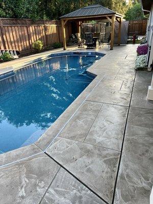 Pool deck and front porch both just concrete before they started.