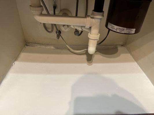 Band aid patch job under sink