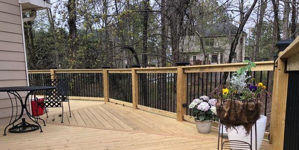 From Vision to Reality: Transforming Backyards in North Atlanta, GA! . A stunning deck with garden stairs.