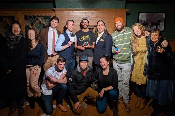 A group shot of audience members celebrating a birthday.